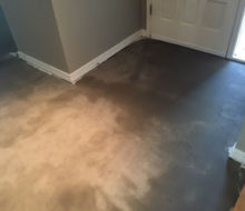 Concrete slab foyer subfloor after tile removed