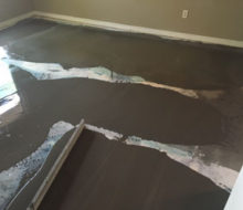 Leveling concrete slab in the home office for wood flooring installation