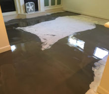 Leveling concrete slab subfloor