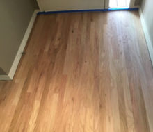 Unfinished, rotary sawn Red Oak wood flooring in foyer