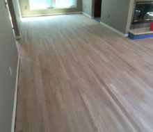 Unfinished, rotary sawn Red Oak wood flooring installed