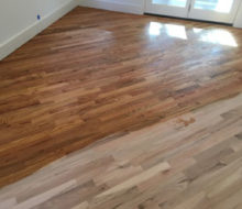 Applying golden oak stain to red oak wood flooring