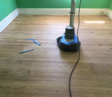 Old heart pine wood flooring after sanding and hand scraping