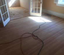 Old heart pine wood flooring after sanding and hand scraping