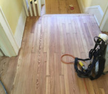 Old heart pine wood flooring after sanding and hand scraping