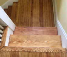 Old heart pine stair treads and white oak landing after refinishing