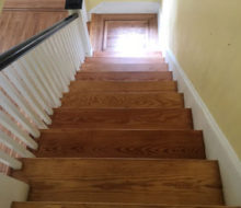 Old heart pine stair treads and white oak landing after refinishing