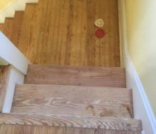 Sanding and hand scraping old heart pine stair treads