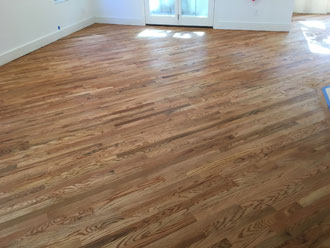 Stained and finished red oak wood flooring