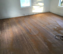 Old heart pine wood flooring before sanding