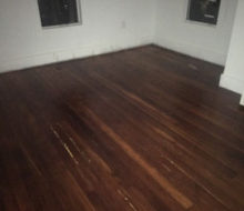 Old heart pine wood flooring before sanding