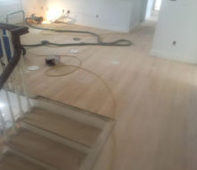 Sanded and hand scraped second floor red oak flooring and stair treads