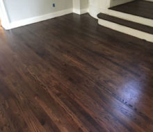 Sanded, stained, and refinished red oak plank flooring & stair treads