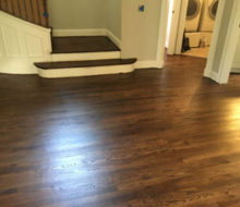 Sanded, stained, and refinished red oak plank flooring & stair treads