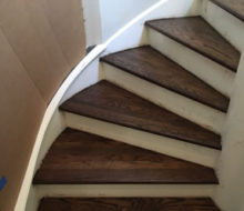 Sanded, stained, and refinished stair treads