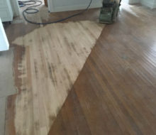 Sanding old red oak wooden flooring