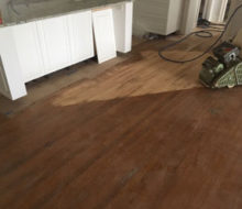 Sanding old red oak wooden flooring