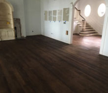 Stained and refinished red oak wood flooring and stair treads