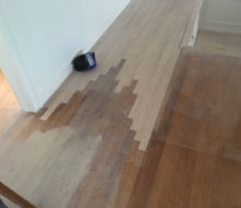 Weave-in repair of red oak wood flooring on the second floor of project home