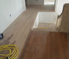 Weave-in repair of red oak wood flooring on the second floor of project home