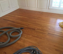 Old, yellowed red oak wood flooring prior to refinishing