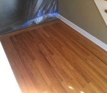 Old, yellowed red oak wood flooring prior to refinishing