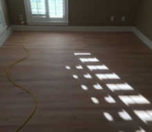 Sanded red oak wood flooring.