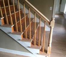 Whitewashed refinished stair rails and newel posts.