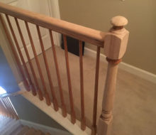 Sanded stair rails and newel posts.