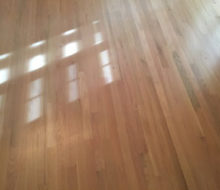 Whitewashed refinished red oak wood flooring.