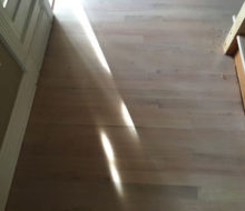 Whitewashed refinished red oak wood flooring.