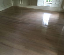 Whitewashed refinished red oak wood flooring.