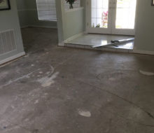 Bare concrete subfloor - carpet removed