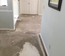 Bare concrete subfloor - carpet removed