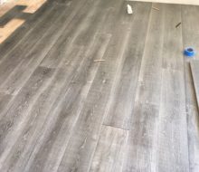 Beachy look White Oak flooring being installed