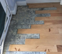 Damaged hickory flooring removed