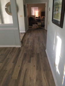 Hickory wood look floor tile installed