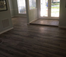 Hickory wood look floor tile installed - elevated floor/step