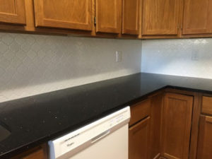 Installed kitchen backsplash tile