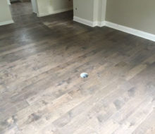 Installed hand scraped engineered birch flooring