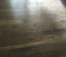 Installed hand scraped engineered birch flooring