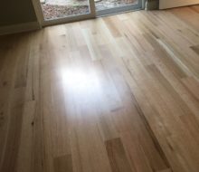 Installed rift and quarter sawn red oak wood flooring