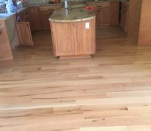 Installed rift and quarter sawn red oak wood flooring