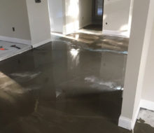 Leveling concrete subfloor