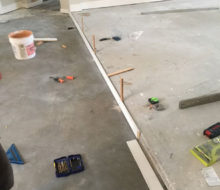 Preparing to level elevated/stepped floor