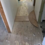 New plywood subfloor installed, prep for wood flooring installation