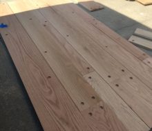 Red oak planks ready for walnut pegs