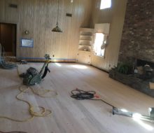 Sanded solid red oak plank, walnut pegged floor