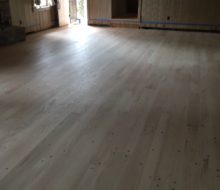 Sanded solid red oak plank, walnut pegged floor