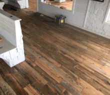 Varied length and width reclaimed heart pine flooring installed